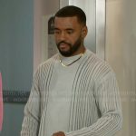 Andre’s grey laddered sweater on Beyond the Gates