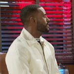 Andre’s off white jacket and side-stripe pants on Beyond the Gates