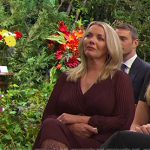 Carrie’s burgundy pleated dress on Days of our Lives