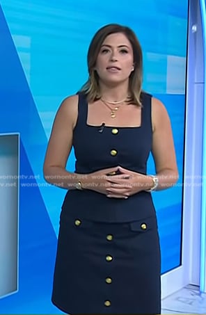 Chloe’s navy sleeveless vest and mini skirt with gold buttons on Today