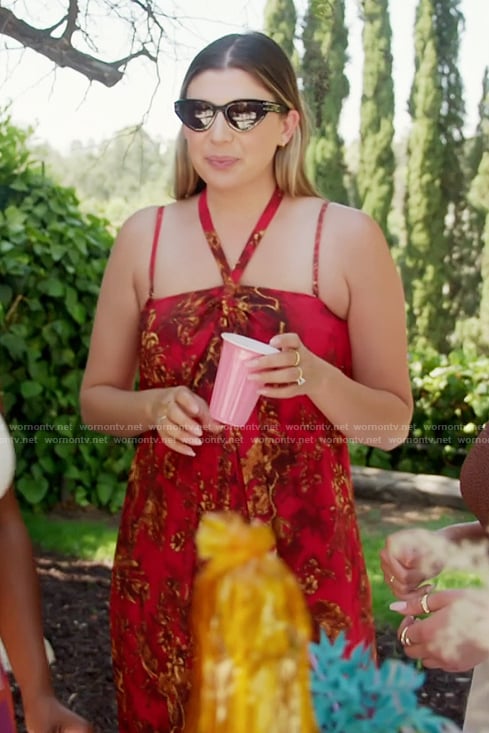 Janet’s red floral print halter dress on The Valley