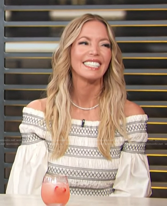 Jeanie Buss’s embroidered top on on Access Hollywood
