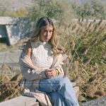 Jen’s white cable knit vest on The Secret Lives of Mormon Wives