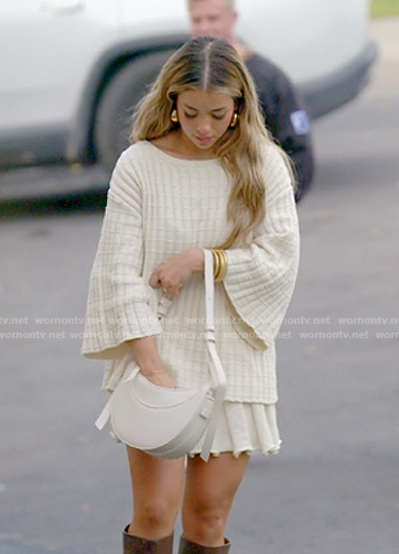 Jen’s textured sweater and mini skirt on The Secret Lives of Mormon Wives