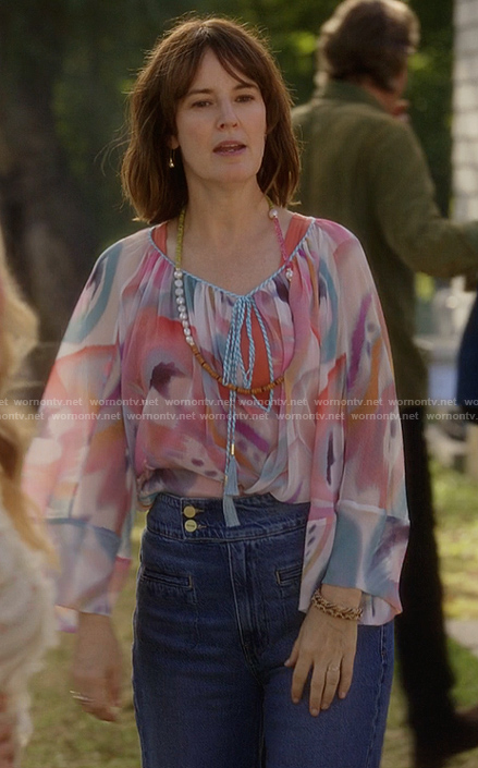 Charlotte’s abstract print tie neck blouse on And Just Like That