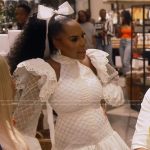 Kelli’s white lace cutout mini dress on The Real Housewives of Atlanta