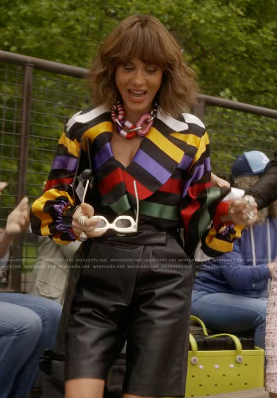 Lisa’s chain link necklace and sunglasses on And Just Like That