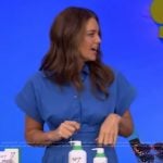 Monica Mangin’s blue belted jumpsuit on Live with Kelly and Mark