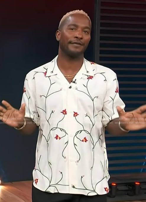 Scott’s white floral print shirt on Access Hollywood