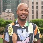 Scott’s multicolor print short sleeve shirt on Access Hollywood