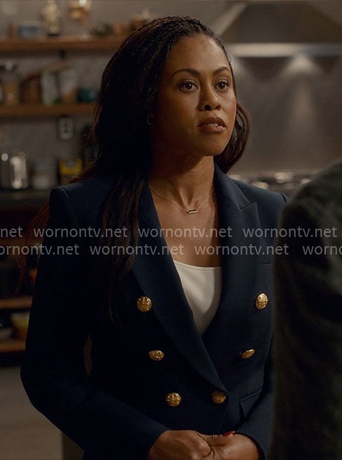 Simone’s navy blazer with gold buttons on Ginny & Georgia