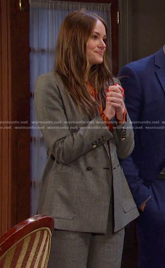 Stephanie’s orange blouse and grey plaid suit on Days of our Lives