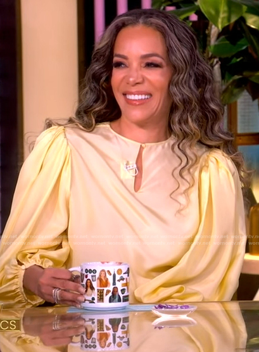 Sunny’s yellow keyhole blouse on The View