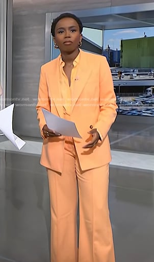 Zinhle’s orange blazer and wide leg pants on NBC News Daily