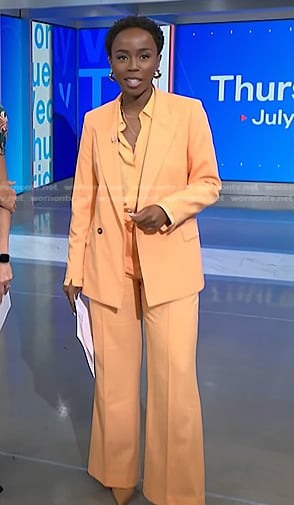 Zinhle’s orange blazer and wide leg pants on NBC News Daily