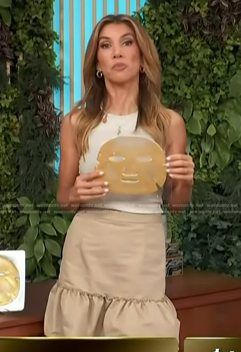 Adrianna Costa’s beige ruffle hem skirt on Access Hollywood