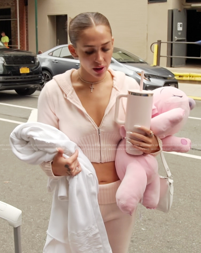 Ariana’s pink cropped hoodie on Next Gen NYC
