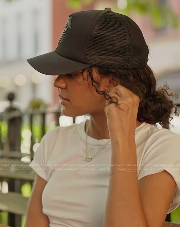 Ava’s black baseball cap on Next Gen NYC