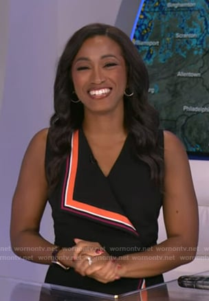 Brittany Bell’s black stripe-trim wrap dress on Good Morning America