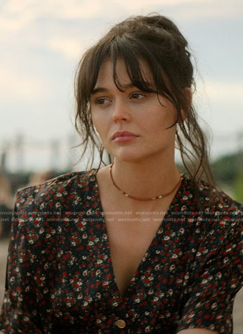 Cadence’s black floral print romper on We Were Liars