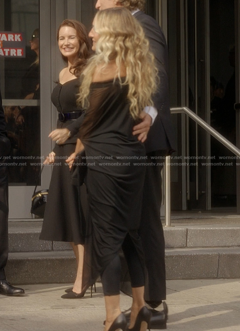 Carrie’s black sheer off shoulder dress on And Just Like That