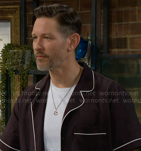 Daniel’s black shirt with white trim on The Young and the Restless