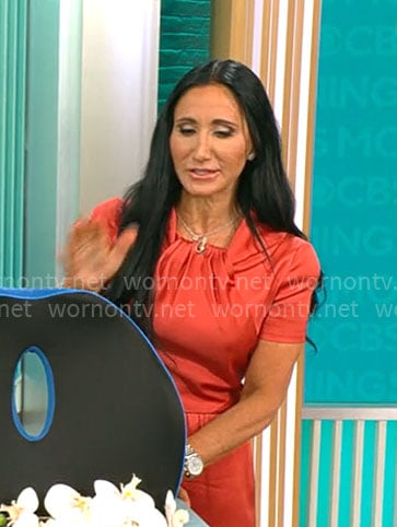 Elizabeth Werner’s short sleeved twist neck dress on CBS Mornings
