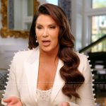 Emily’s white pearl trim confessional blazer on The Real Housewives of Orange County