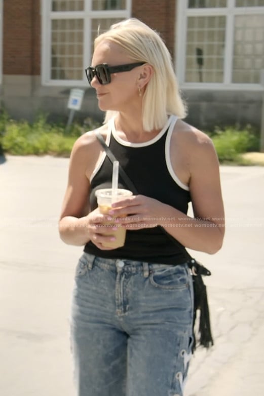 Galyna’s black contrast tank and lace-up jeans on The McBee Dynasty Real American Cowboys