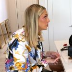 Gina’s white printed blouse and leather mini skirt on The Real Housewives of Orange County