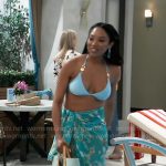 Jordan’s blue bikini and floral sarong on General Hospital