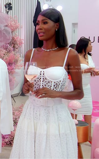 Kiki’s white eyelet belted dress on The Real Housewives of Miami