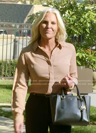 Kristi’s black bag on The McBee Dynasty Real American Cowboys