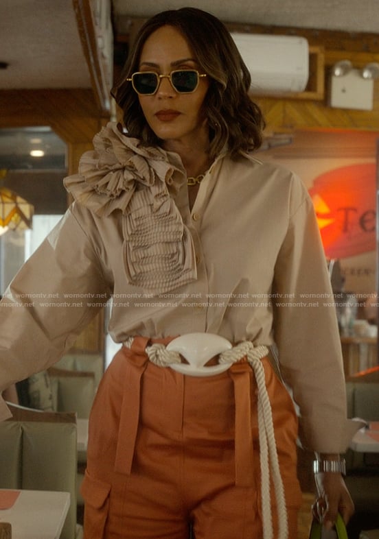 Lisa’s beige ruffle shoulder top on And Just Like That