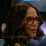Lisa’s red glasses on And Just Like That