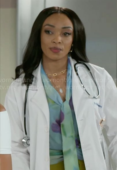 Madison’s blue floral tie-neck blouse on Beyond the Gates