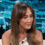 Maggie Q’s white floral one-shoulder mini dress on Access Hollywood