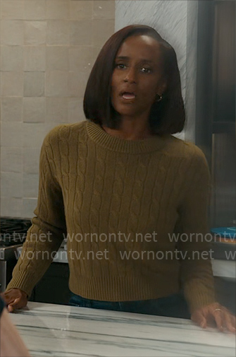 Olympia’s green cable-knit sweater on Matlock