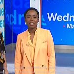 Zinhle’s orange blazer and wide leg pants on NBC News Daily