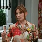 Pamela’s floral graphic button down top on Beyond the Gates