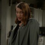 Steffy’s black ring keyhole top and green satin jacket on The Bold and the Beautiful