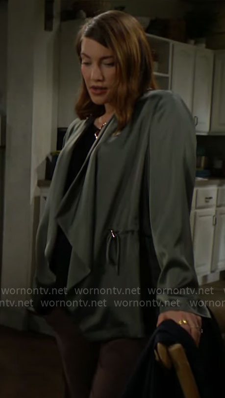 Steffy’s black ring keyhole top and green satin jacket on The Bold and the Beautiful