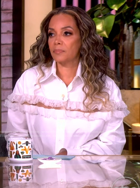 Sunny’s white lace ruffle blouse on The View