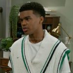 Tyrell’s sewater vest with green trims on Beyond the Gates