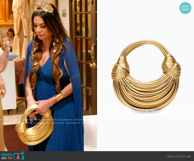 Verano Hill Amanda Handbag in gold worn by Adriana de Moura (Adriana de Moura) on The Real Housewives of Miami