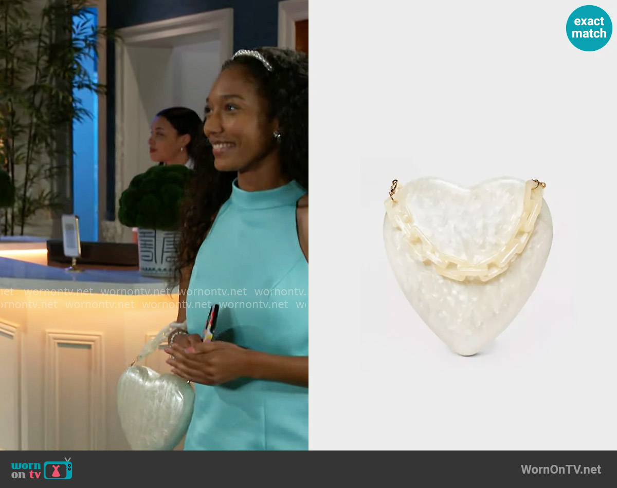 A New Day Pearl Heart Minaudiere Top Handle Bag worn by Samantha Richardson (Najah Jackson) on Beyond the Gates
