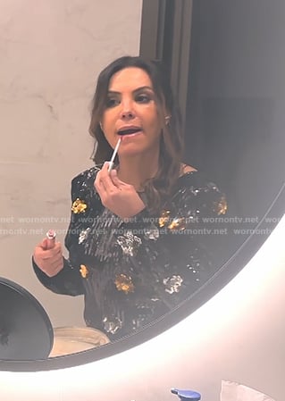 Adriana’s black sequin floral dress on The Real Housewives of Miami