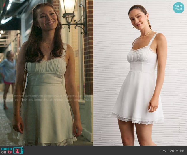 AE x The Summer I Turned Pretty Mini Dress in White worn by Belly Conklin (Lola Tung) on The Summer I Turned Pretty
