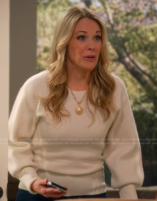 Becca’s white puff sleeve sweater on Leanne