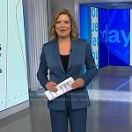 Christine Romans’ blue satin blazer and pant set on NBC News Daily